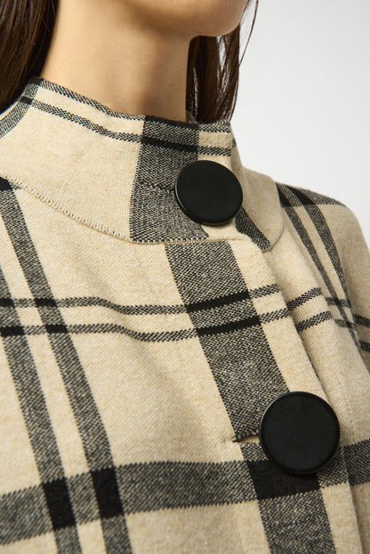 Poncho de punto de cuadros champán y negro 253903