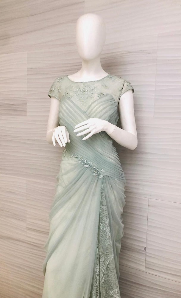 Vestido menta de tul plisado AGQ1407L